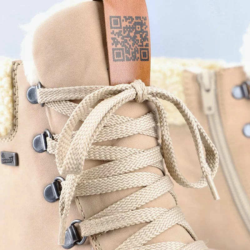 Izolirane in vodoodporne ženske škornje Rieker, kremne