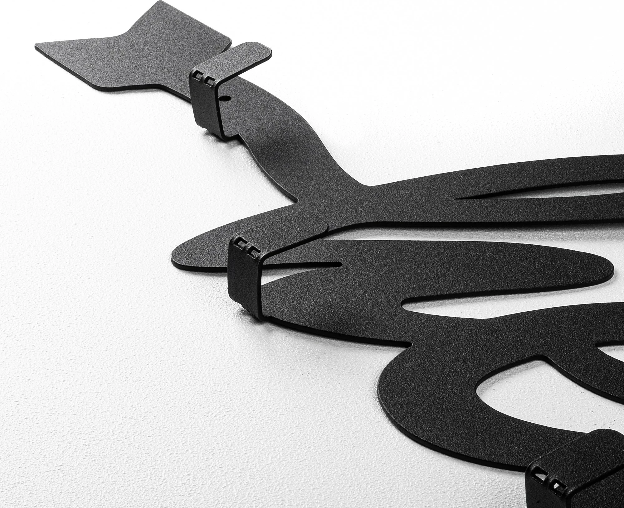 Varovalo za steno iz kovine Wallity, Hello, črna, 68x22x2 cm