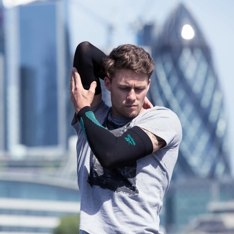 Kompresijske rokavice Reebok, črne in zelene, unisex