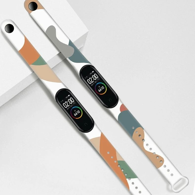Silikonski trak kamuflaža Hurtel Moro za Xiaomi Mi Band 3/4, bela/bež/oranžna