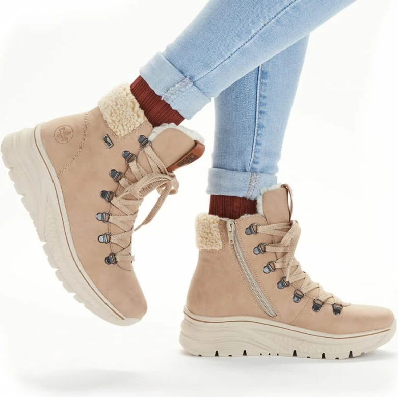 Izolirane in vodoodporne ženske škornje Rieker, kremne