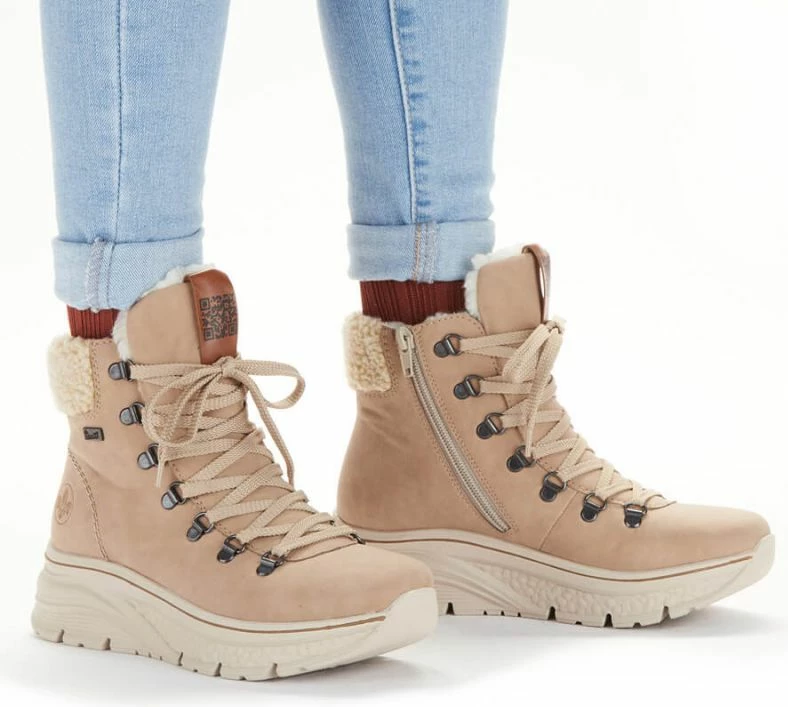 Izolirane in vodoodporne ženske škornje Rieker, kremne