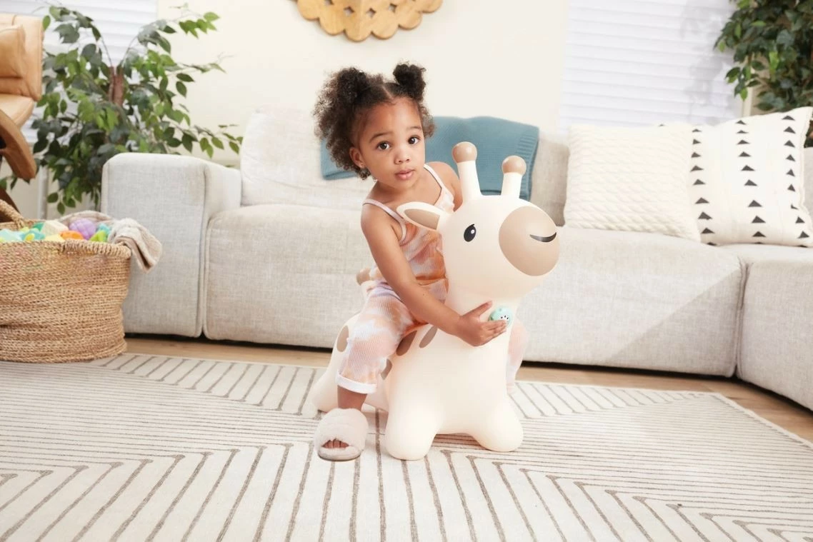 Gumena skakalna igrača, B-kids 116315223, z 3 melodijami, z ročno tlačilko, 10+ mesecev, rjava/krem