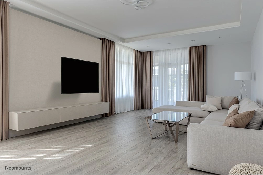 Stenski nosilec za TV Newstar Neomounts WL40-550BL14, polni premik, 32-55 in, VESA 400x400, črn