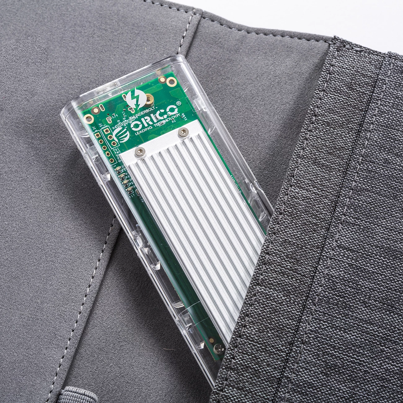 Ohišje za SSD M.2 NVMe Orico TCM2-C3, USB-C 10Gb/s, sivo/prosojno