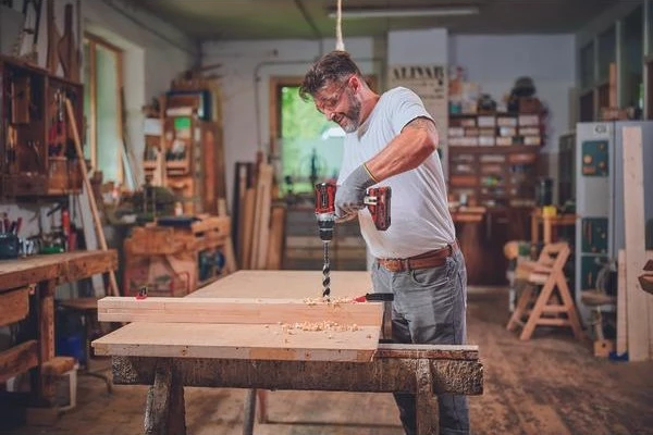 Brezkrtačen vrtalnik-vijač Einhell TP-CD 18/60 Li BL Solo, 18 V, 2 hitrosti, brez baterije, črn/rdeč