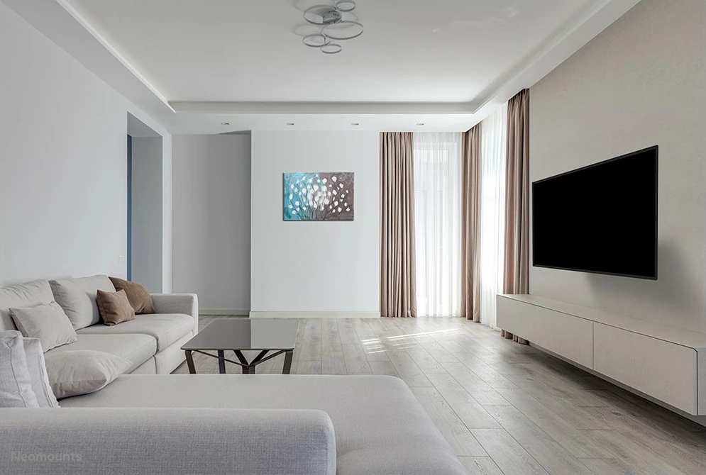 Stenski nosilec za TV 43"–86", Neomounts Newstar, črn