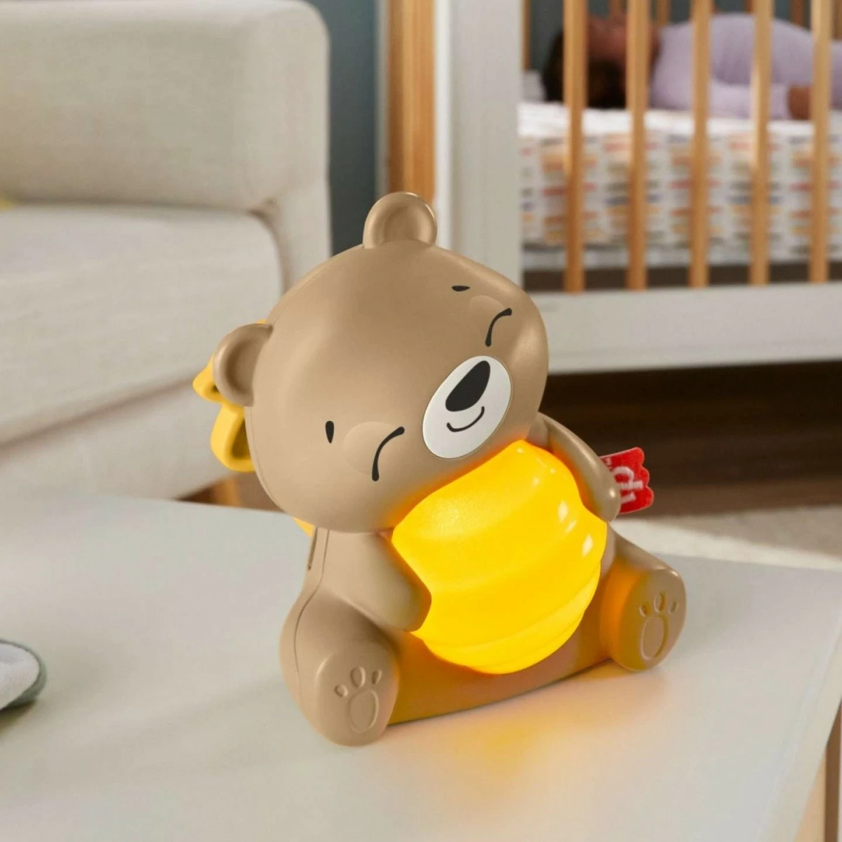 Igrača za pomirjanje z glasbo in svetlobo Fisher Price Teddy Bear Soother HRB18, rjava/rumena